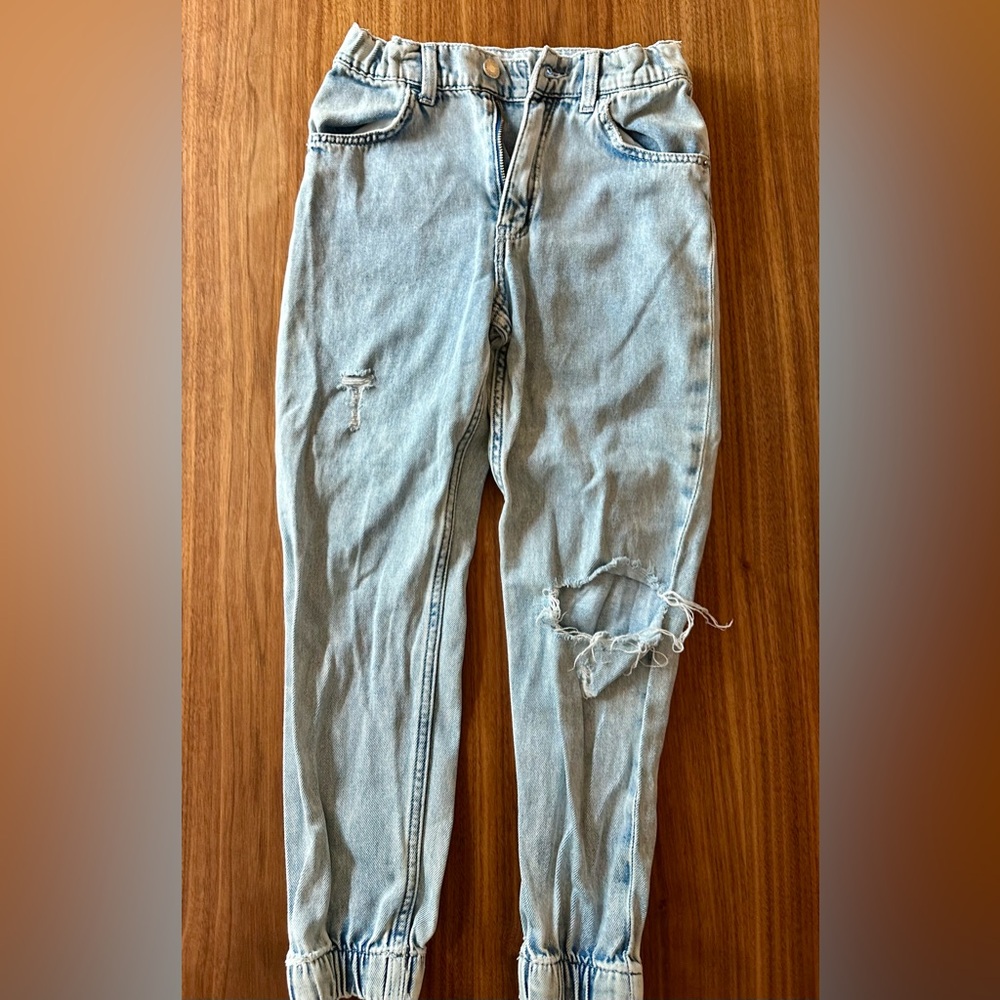 Girls H&M denim jogger pants size 10 with rip and knee cutout